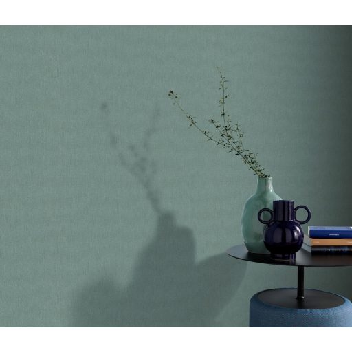 Strukturált egyszínű textilhatású minta zöld tónus tapéta