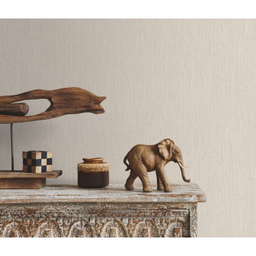 Finom vonalstruktúrájú fémes hatású egyszínű minta krém és bézs tónus enyhe fény tapéta