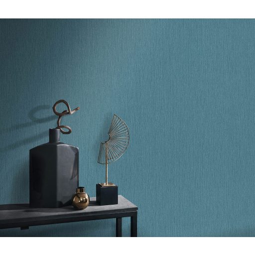 Finom függőleges vonalvezetésű barázdák - egyszínű texturált minta kék/türkizkék tónus finom fény tapéta