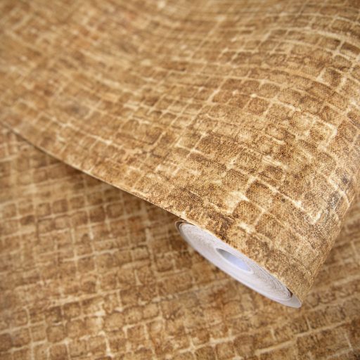 Kopott szőnyegre emlékeztető szabálytalan változatos árnyalatú négyzetek mintája arany aranybarna és krémszín tónus tapéta