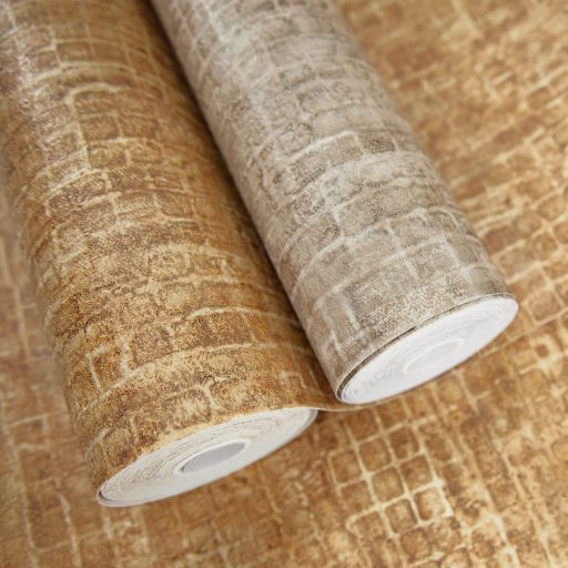 Kopott szőnyegre emlékeztető szabálytalan változatos árnyalatú négyzetek mintája arany aranybarna és krémszín tónus tapéta