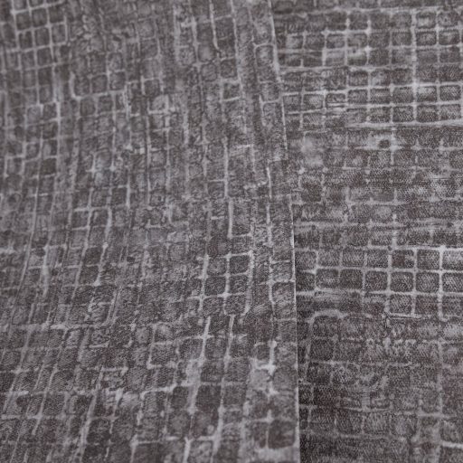 Kopott szőnyegre emlékeztető szabálytalan változatos árnyalatú négyzetek mintája antracitszürke és gránitszürke tónus tapéta