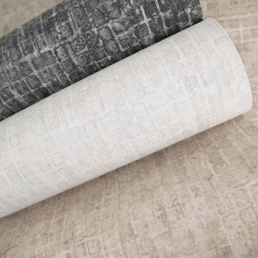 Kopott szőnyegre emlékeztető szabálytalan változatos árnyalatú négyzetek mintája világosbézs/homokszín tónus tapéta