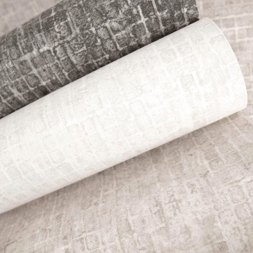 Kopott szőnyegre emlékeztető szabálytalan változatos árnyalatú négyzetek mintája krémszín és finom bézs tónus tapéta