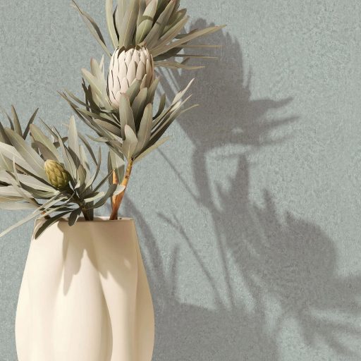 Szórt fémes hatású texturált minta zöld/szürkészöld tónus finom fény tapéta