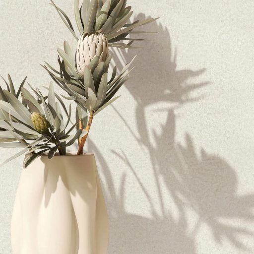 Szórt fémes hatású texturált minta krém és világosbézs tónus finom fény tapéta