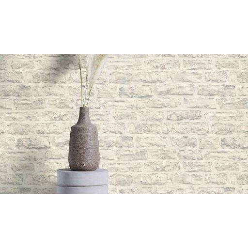 Meszelt téglafal - szabálytalan méretű durván faragott kopott téglák mintája törtfehér krém és halványszürke tónus tapéta