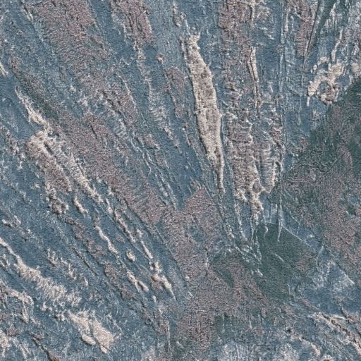 Drámai mégis meditatív art deco ihletésű legyező motívum mélykék szürkésbarna agyagszürke és ezüstszürke tónus fémes hatás tapéta