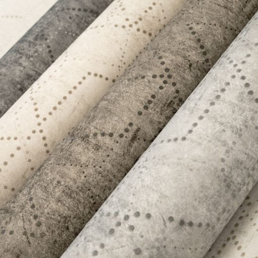 Applikált üveggyöngyökkel díszített holdi tájat krátereket imitáló körökből pontokból álló minta homokszín bézs és bézsarany tónus tapéta