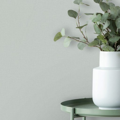 Természetes szinte lélegző texturált vászonhatású minta pasztell zsályazöld tónus tapéta