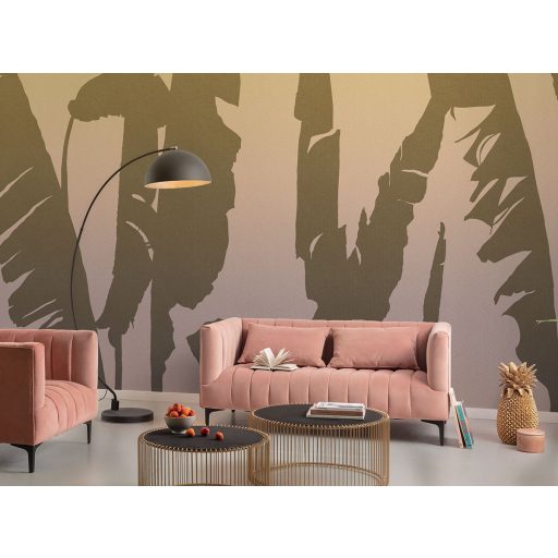 Modern és egzotikus óriás banánlevelek sziluettje naplementében meleg sárga bézs barna és rózsaszínes barna tónus falpanel