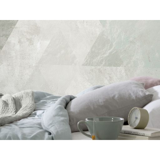 Játékos könnyedségű nagyformátumú rombuszminta beton háttéren zöld szürkészöld és szürkésfehér tónusok falpanel/digitális nyomat